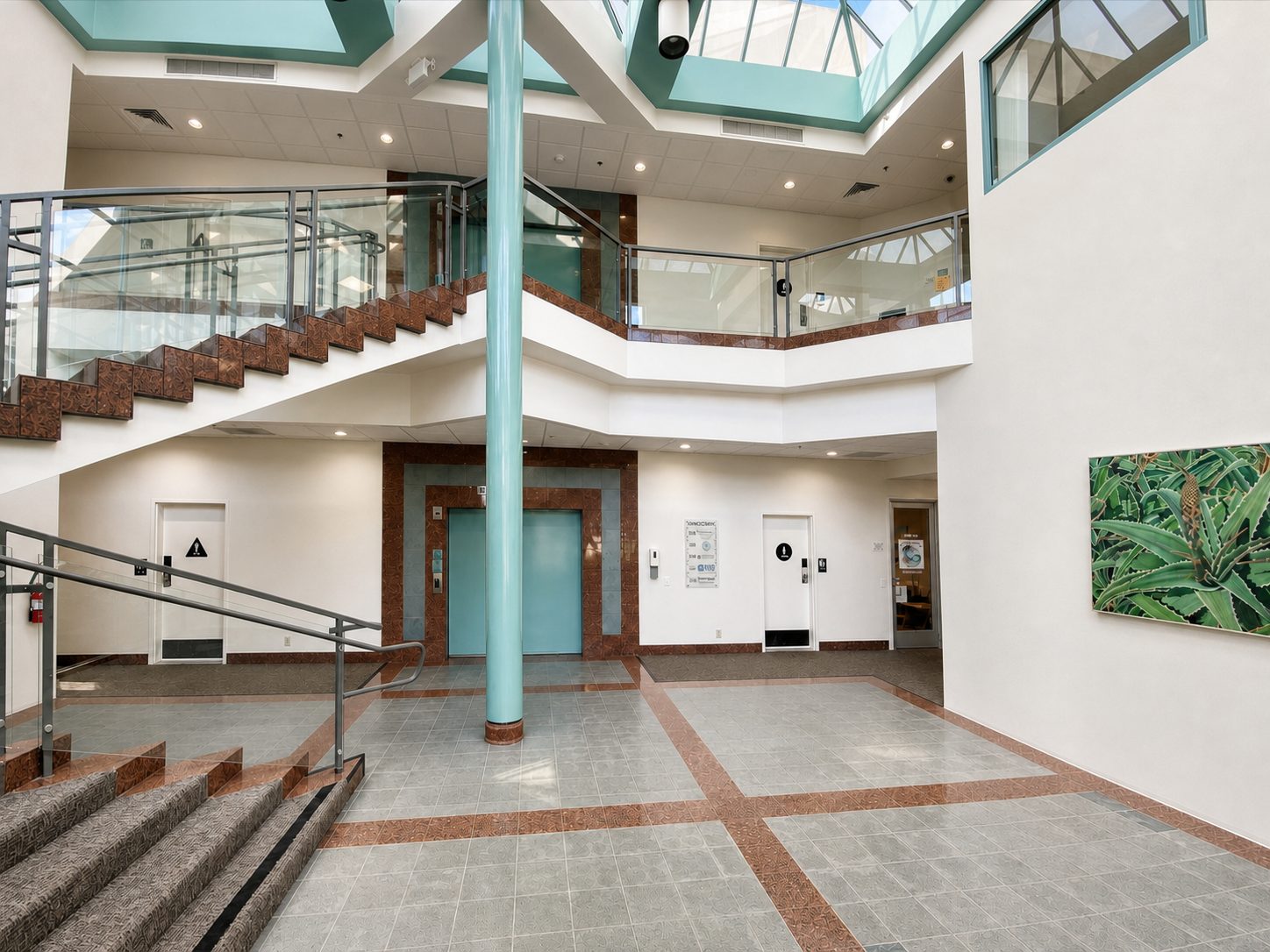 Two-story skylit atrium lobby